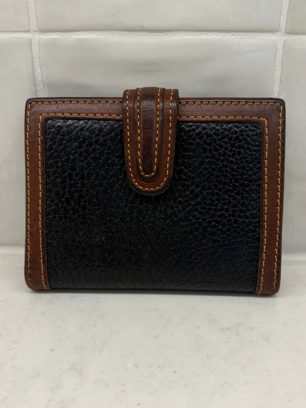 Coach Vintage Sheridan Black Pebbled Leather Bifold Wallet with Brown Trim
